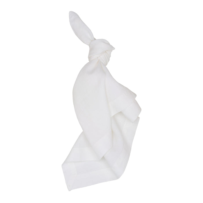 White HG Signature hand-dyed 22" square linen napkin, tied in a knot.
