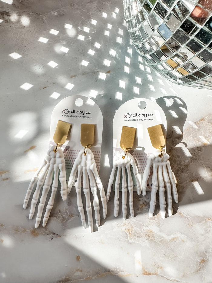 White Skeleton Hand Earrings