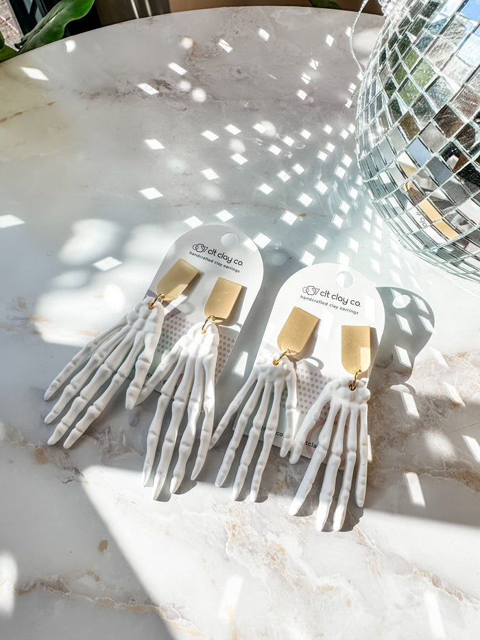 White Skeleton Hand Earrings