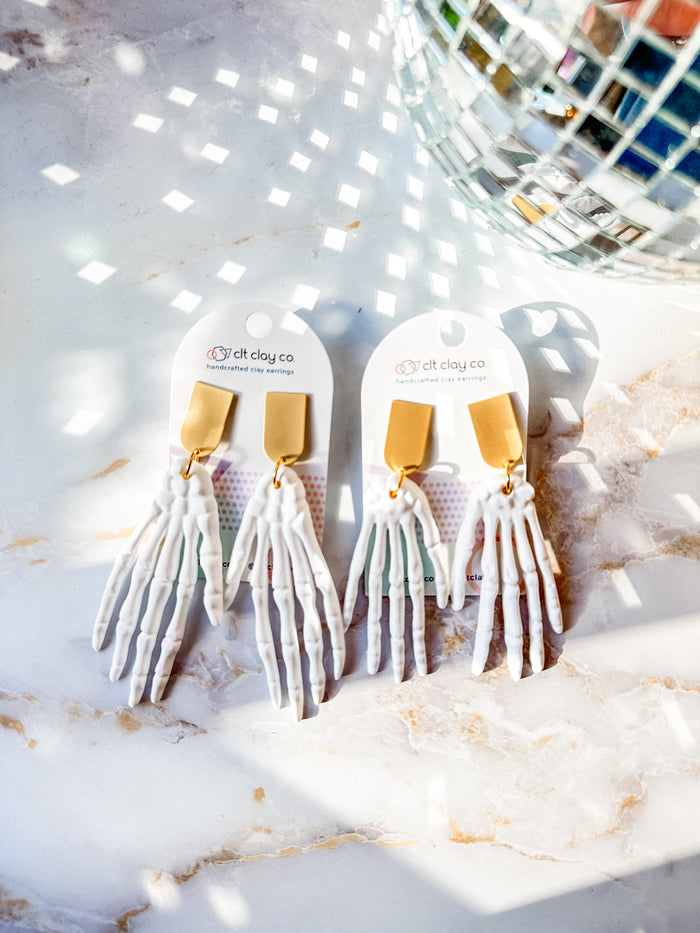 White Skeleton Hand Earrings