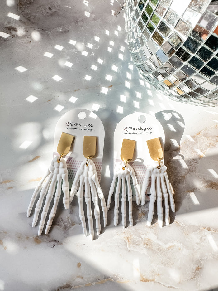 White Skeleton Hand Earrings