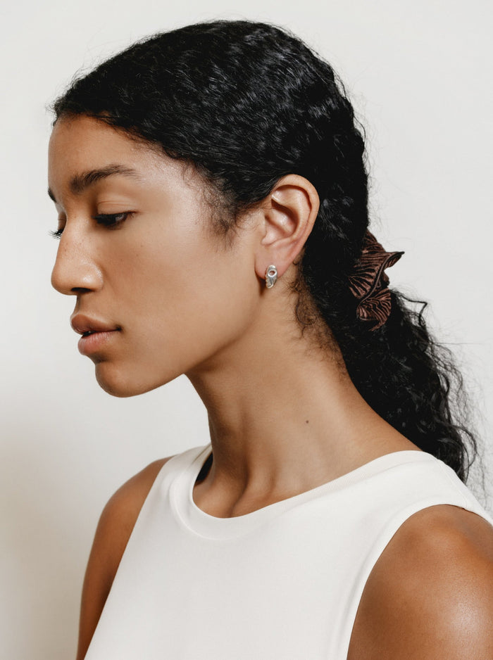 Model Styled in Silver Wolf Circus Esther Earrings