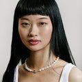 Lola Pearl Necklace with Silver Flower Clasp by Wolf Circus