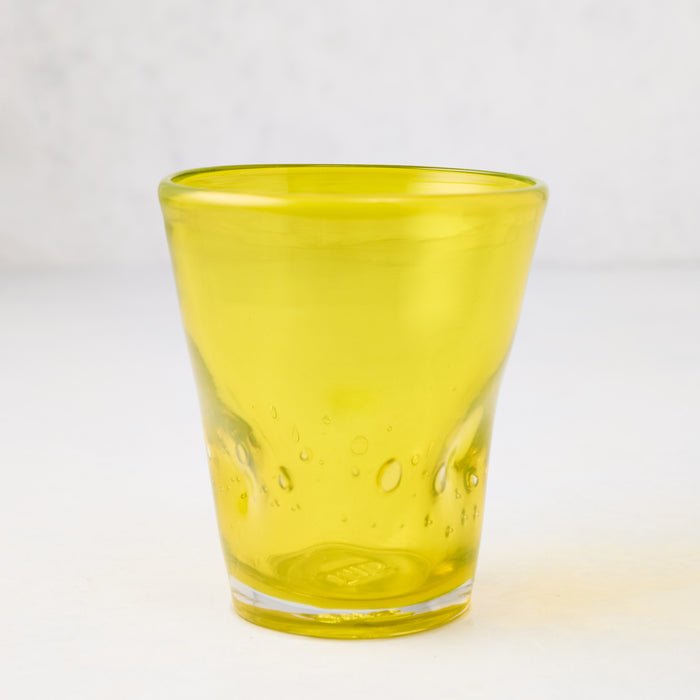 Yellow Henri 8 oz. mouth-blown glass with unique imperfections and air bubbles.